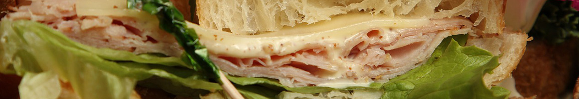 Eating Sandwich Bakery at Briar Rose Bakery & Deli restaurant in Farmington, AR.